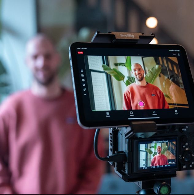 Camera monitor showing a live interview